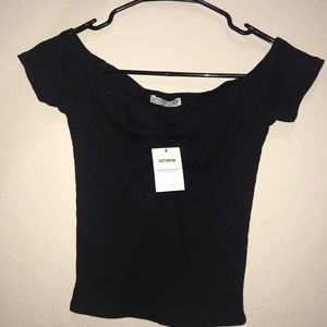 Cute off the shoulder black top!